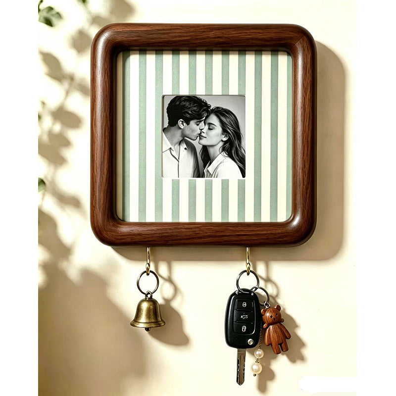 Option 15x15 Hook Style 11: dark wood wall photo frame with sage green and cream striped backing and two key hooks