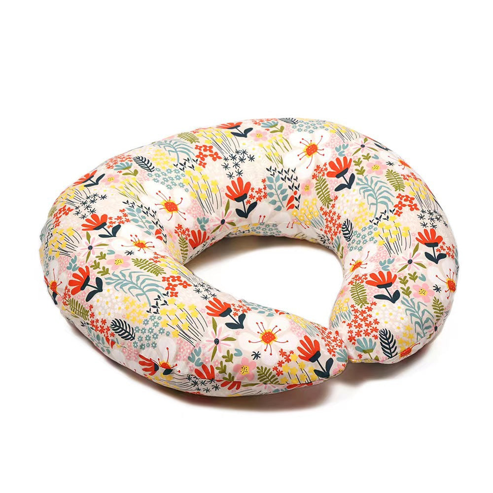 Nursing pillow with a bold red, yellow and orange flower print cover, option Flower World Pillowcase