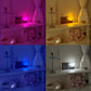 Four panels showing the heart night light in pink, warm, blue and white