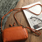Retro leather women's shoulder bag in cowhide, front view showing the structured body