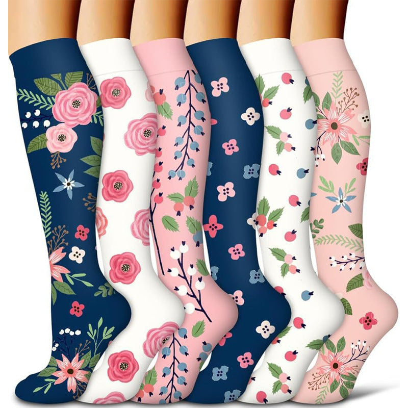 Knee high compression cycling socks with a ribbed cuff and textured sole