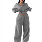 Light gray cropped half-zip sweatshirt and wide-leg sweatpants set on a model, size L option