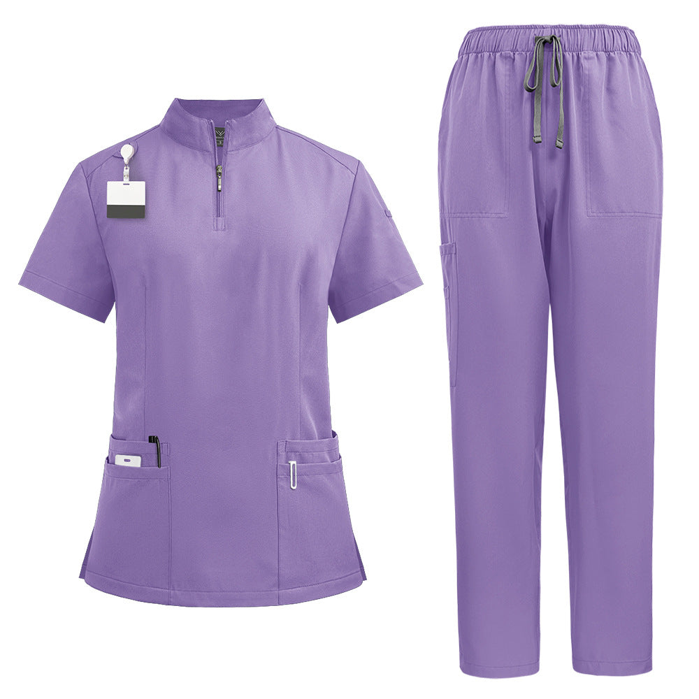 Scrub top shoulder and sleeve seam shown in detail on a plain background