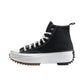 Black high-top platform canvas sneaker side view with a chunky white sole, gum front tread and black rear tread