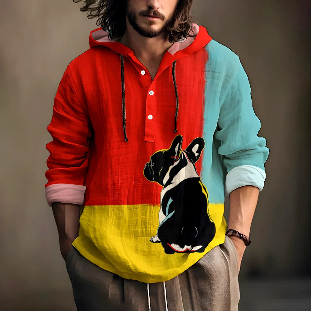 Man wearing a hooded henley shirt in a red, aqua and yellow color block with a French bulldog print