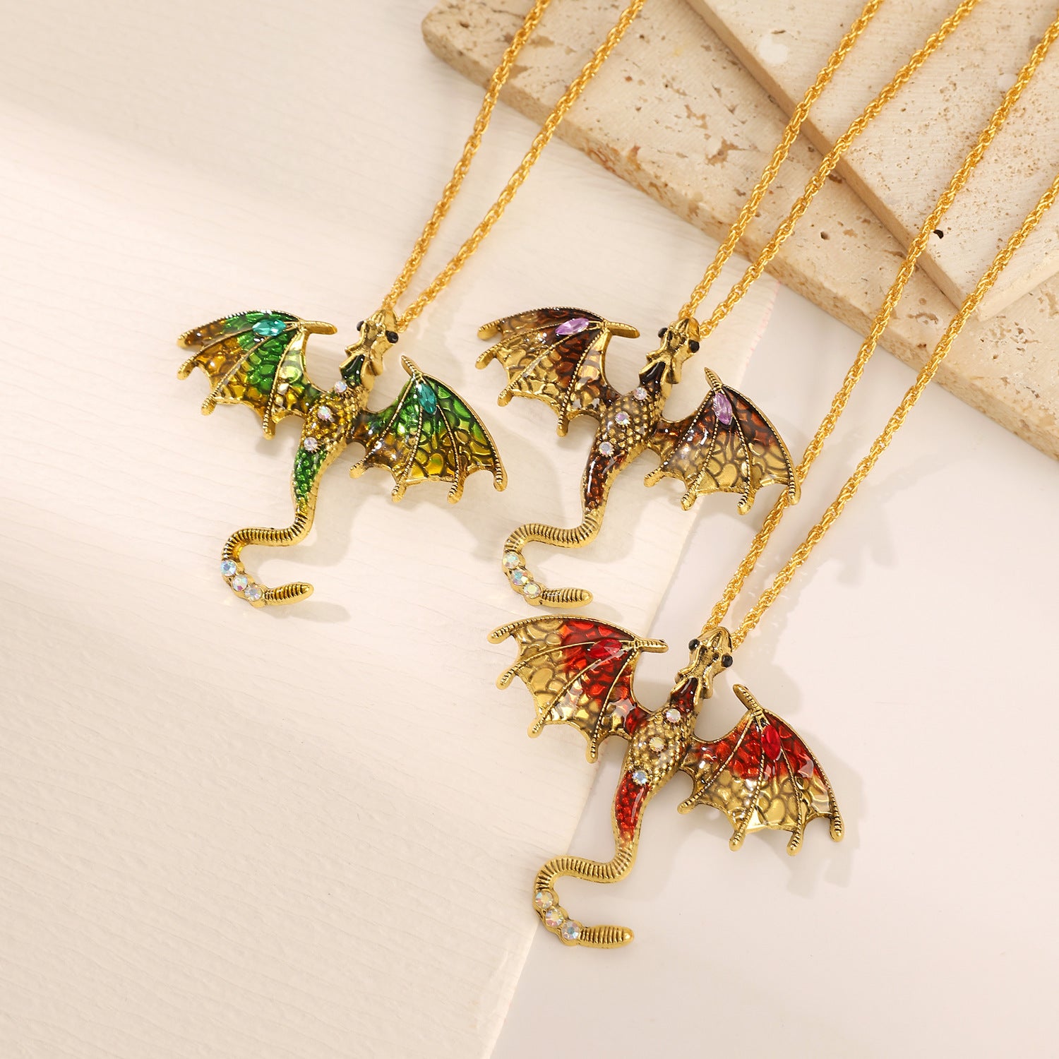 Dragon pendant necklace worn at the collar over an everyday outfit
