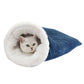 Dark blue waffle weave cat sleeping bag with white fleece lining on a white background, cat peeking out