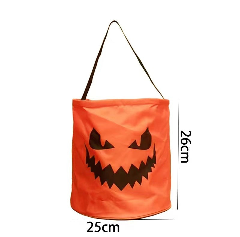Unlit orange pumpkin party bag with a carved face beside a 26 by 25 centimetre size note