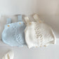 Close up of the baby romper knit cotton texture and even stitching
