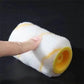 Single white roller with a yellow stripe and a yellow core held under a fingertip, Yellow Roller option
