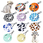 Pet bucket sun hat with ear holes and chin cord in a yellow duck print