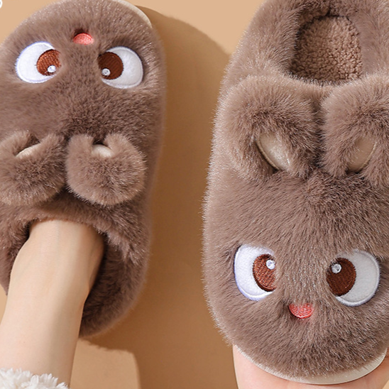 Dark brown cartoon bunny plush slippers seen from above on a foot, standard style, option photo for size 36/37