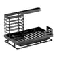 Black carbon steel sink caddy showing the upright brush cage and slotted drip tray base