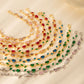 Side profile of the zircon gold leaf bracelet showing the slim chain and leaf links