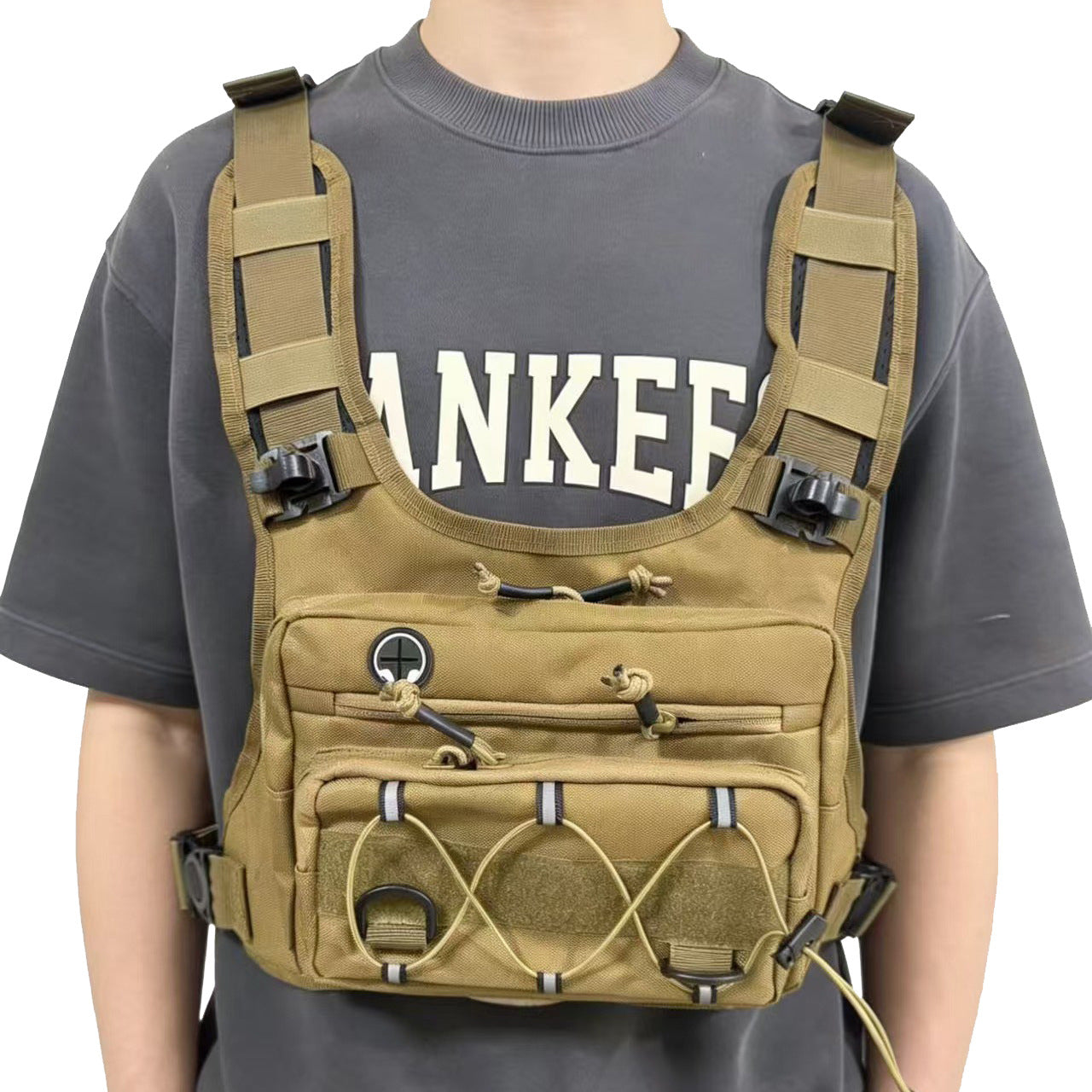 Desert camo chest pack shown from the front with the pocket zips closed