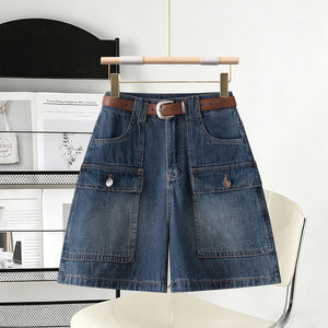 Vintage blue denim shorts front view with brown belt and cargo flap pockets