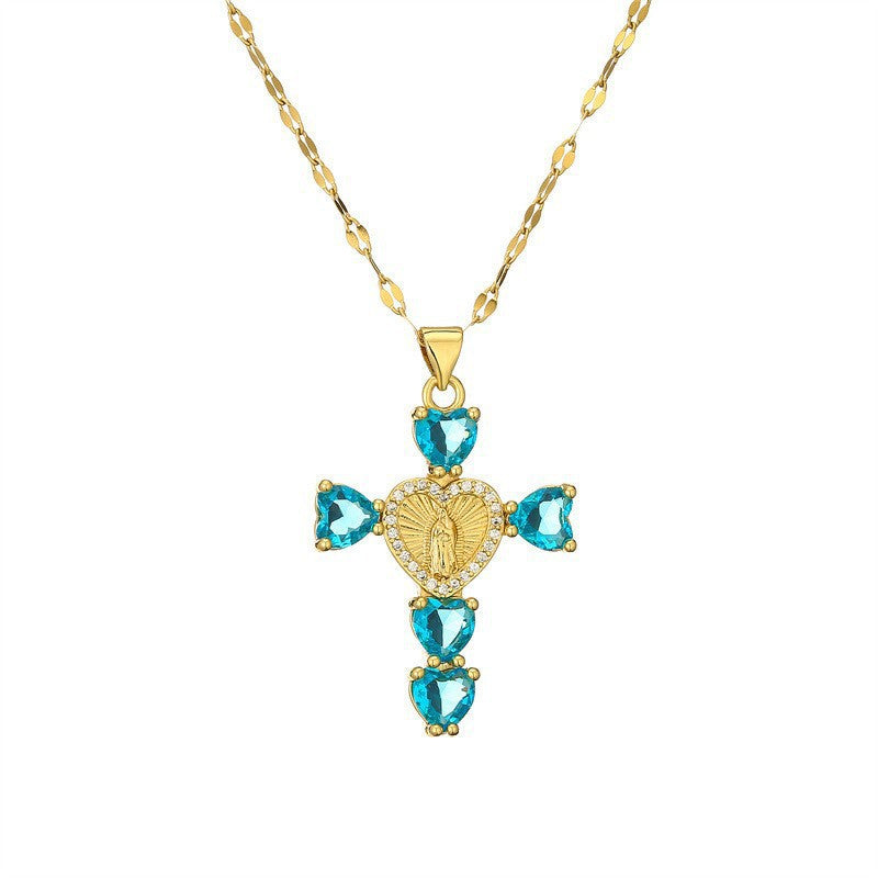 Marquise cut colored cubic zirconia cross pendant on a fine chain, angled view