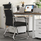 Side view of a black ribbed high back leather cantilever chair with padded armrest and chrome sled base at a desk
