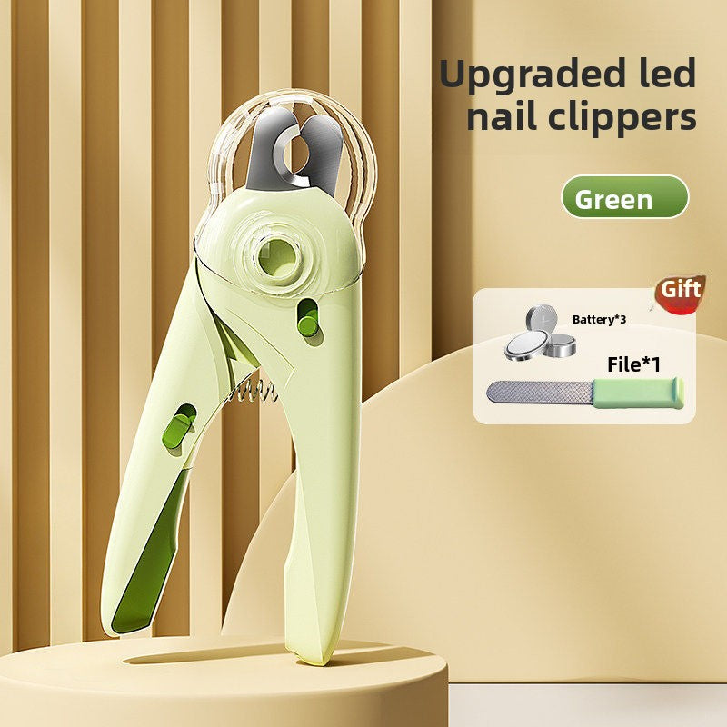 Close view of the stainless cutting head and round LED lens on the white pet nail clipper