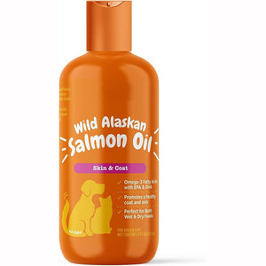 Bottle of salmon oil with pump dispenser on a kitchen counter at breakfast