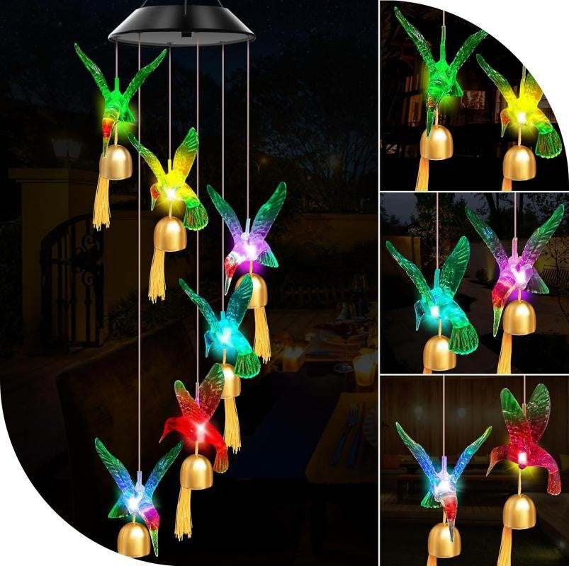 Hummingbird LED figures with golden bells and tassels hanging from a solar lamp head, black housing option