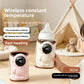 Pink and beige astronaut style bottle warmer sleeves, one wrapped around a baby bottle, with temperature settings listed