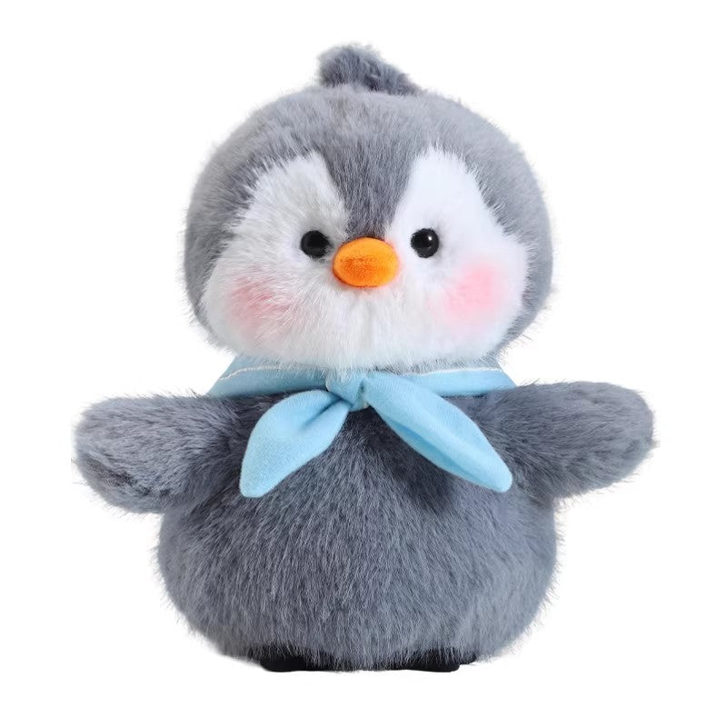 Grey and white penguin plush toy with an orange beak on a white background