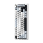 White and grey mechanical keyboard with black accent keys and a silver rotary knob on a white background