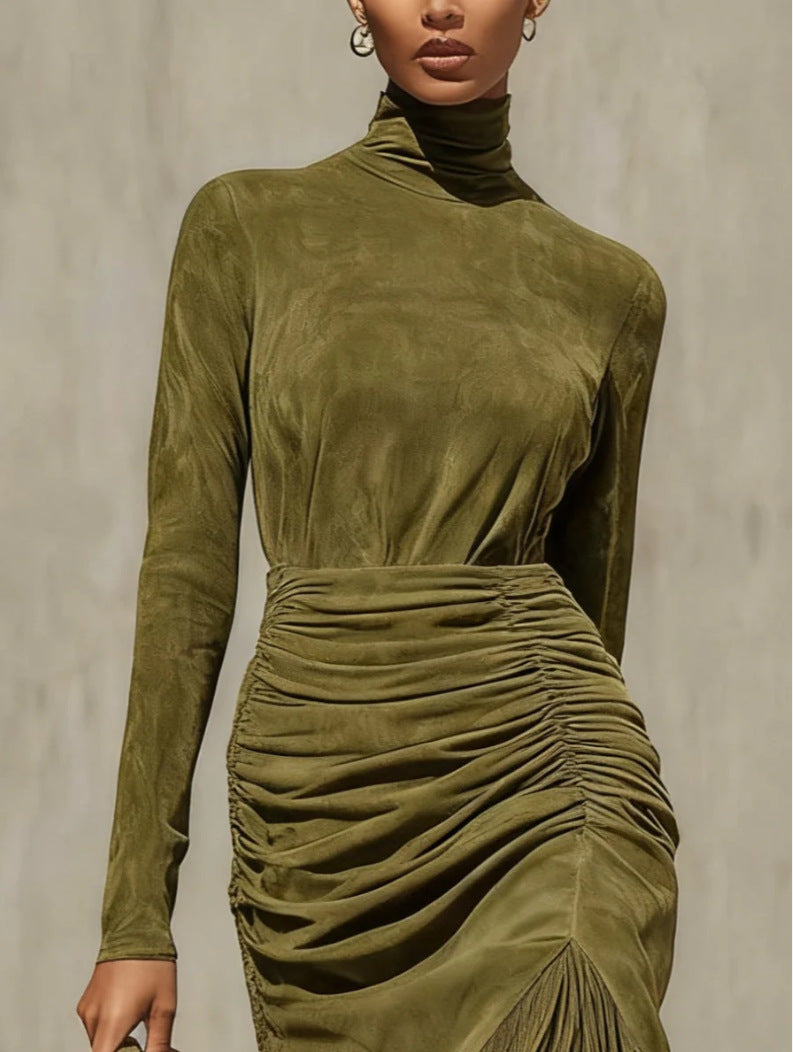 Close up of the olive green mock neck bodice and gathered ruching at the waist of the long sleeve dress