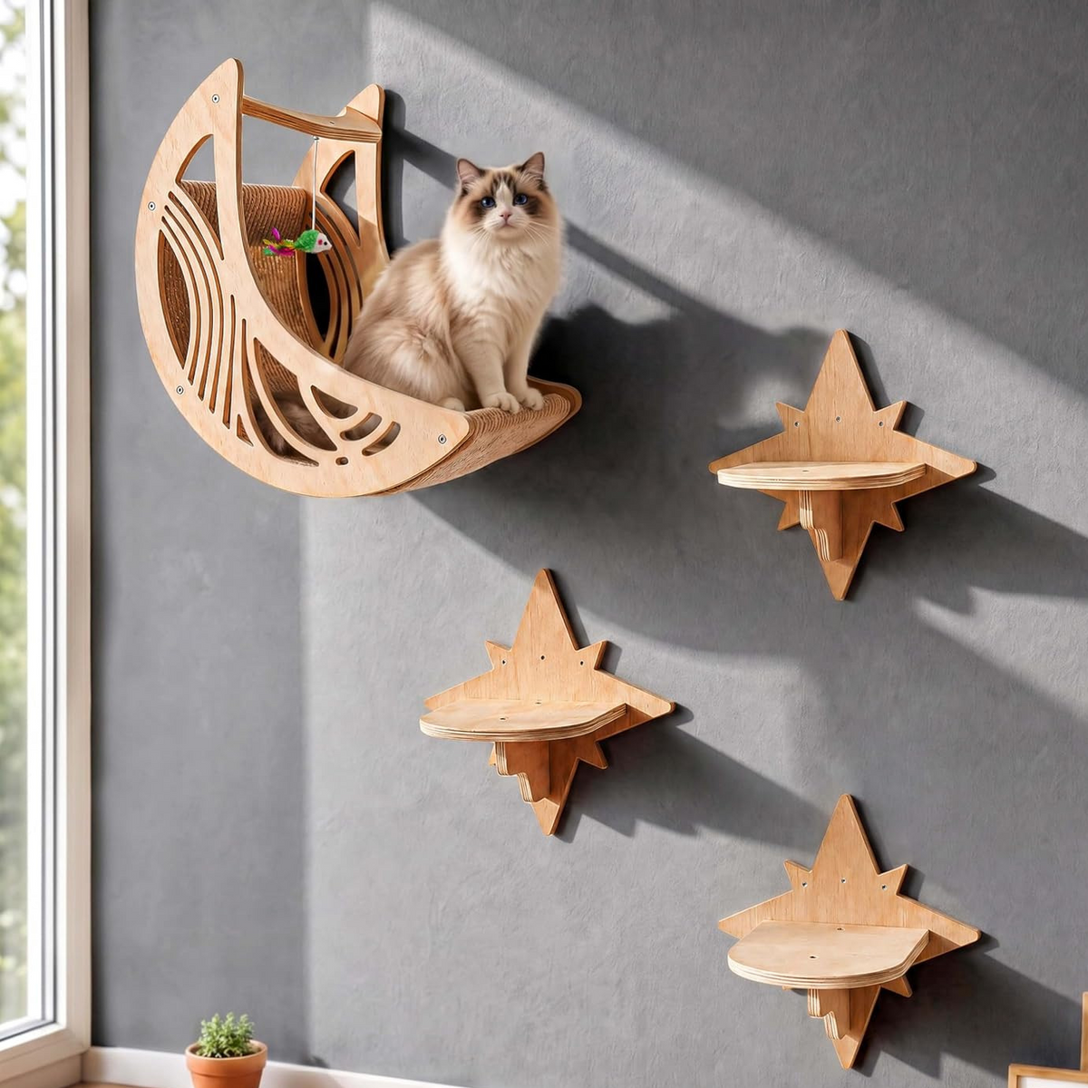 Three star shaped wooden cat wall perches arranged in a rising line on a wall