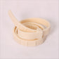 Grey essential oil pet collar resting on a light studio surface