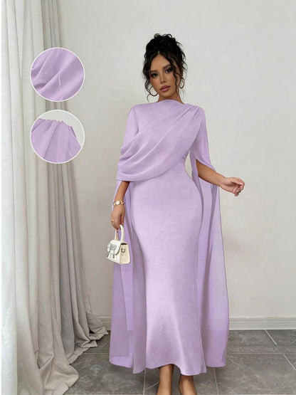 Lilac chiffon cape sleeve long gown with cinched waist and floor length skirt, on model
