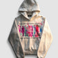 Art graffiti hoodie fabric held for scale reference