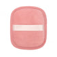 Reusable makeup remover pad with a satin hand strap shown on a plain background