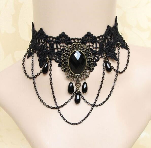 Vintage lace choker necklace with a faceted cabochon centre and hanging bead drops