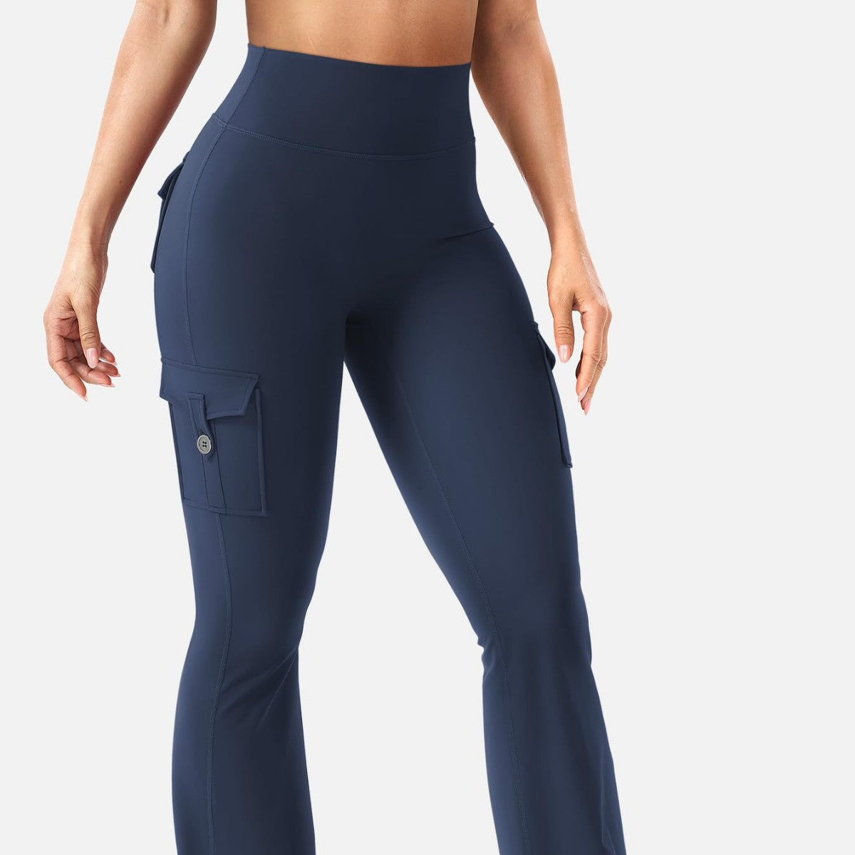 Cargo pocket flared yoga pants worn during a studio class