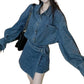 Side profile of the denim shirt and wrap skort set showing the relaxed drape