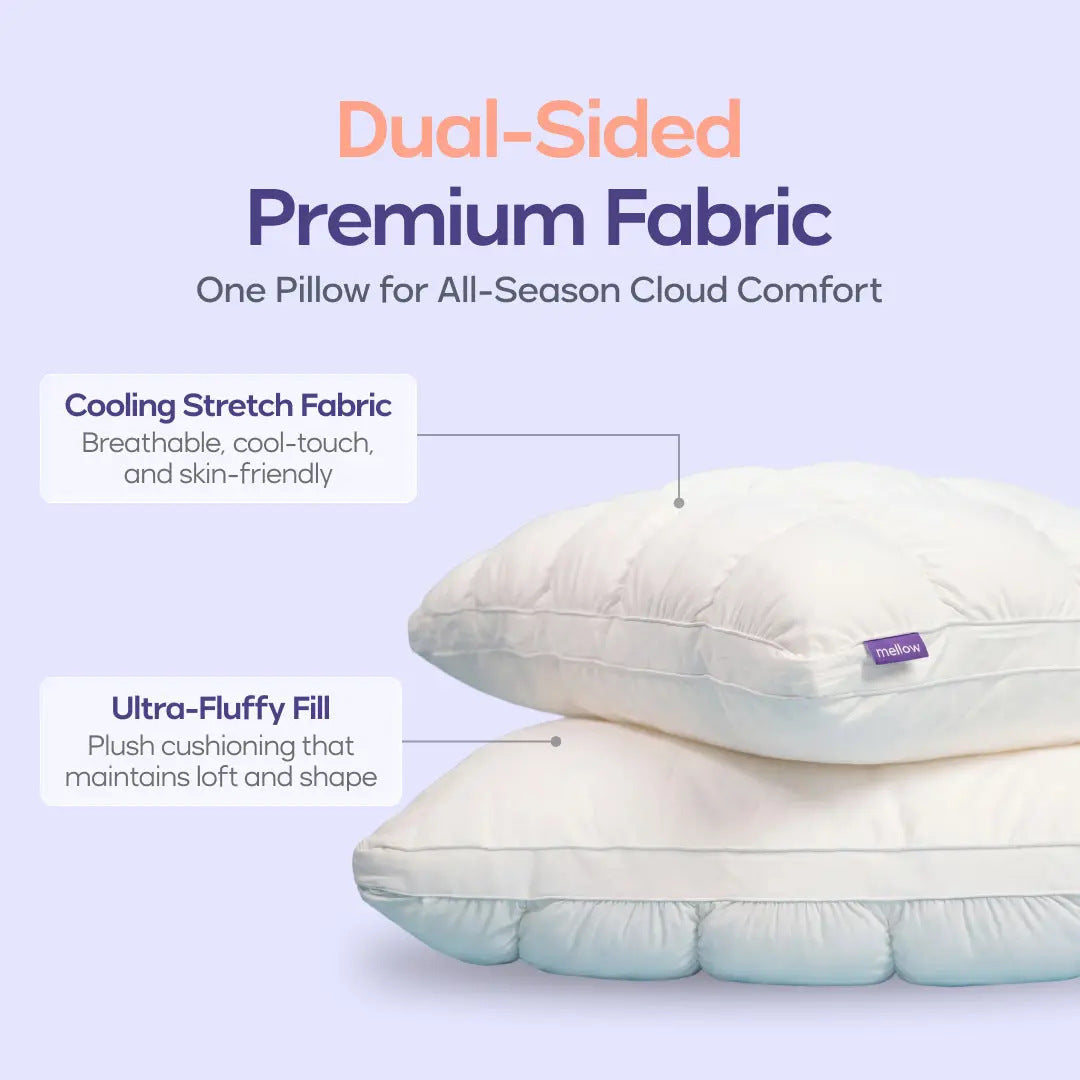 Two cream puff grid bed pillows stacked to show the quilted top and smooth side panel