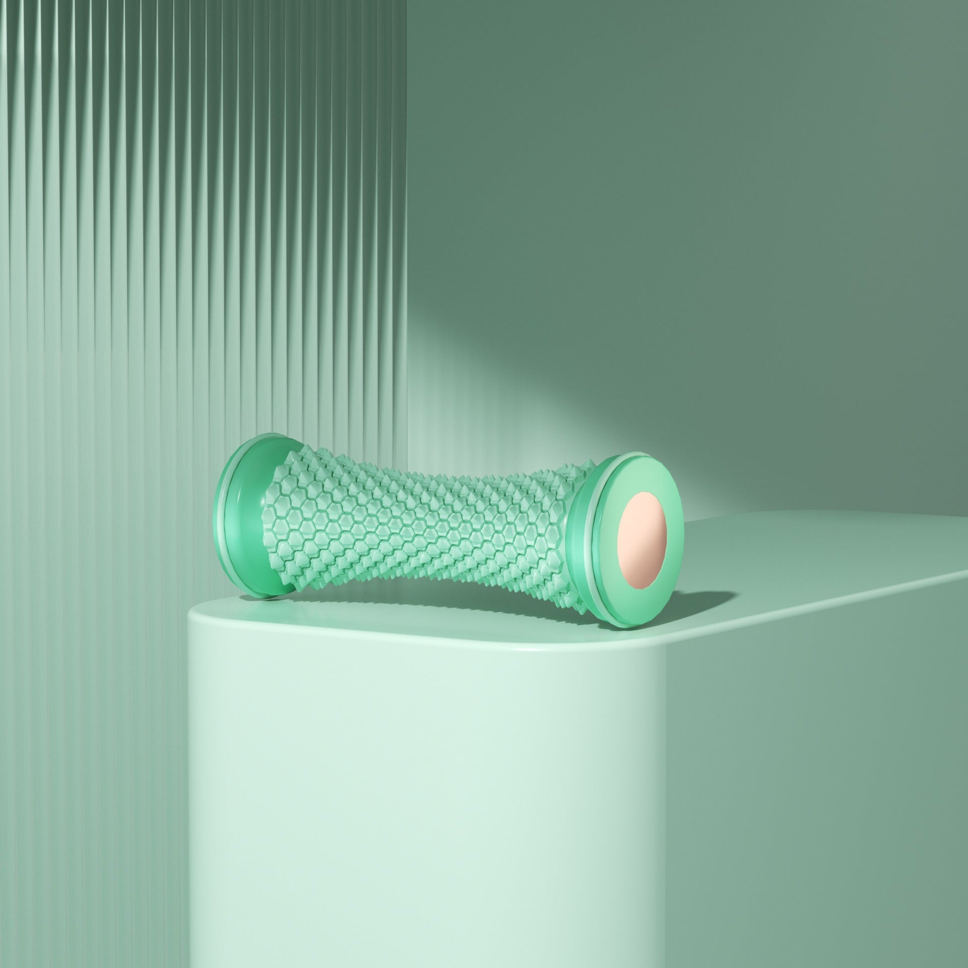 Angled hero shot of the spiky foot massage roller and its textured barrel