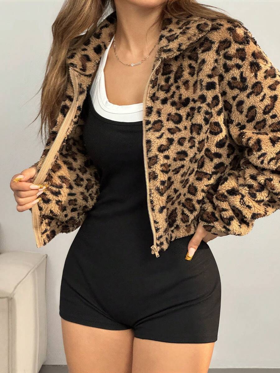 Cropped brown leopard vegan fur jacket with full front zip shown on a standing model
