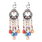 Vintage boho tassel clip-on earrings for non pierced ears, zinc alloy drop pair photographed on white background