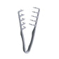Close up of the hooked teeth on the plastic styling comb on a plain background