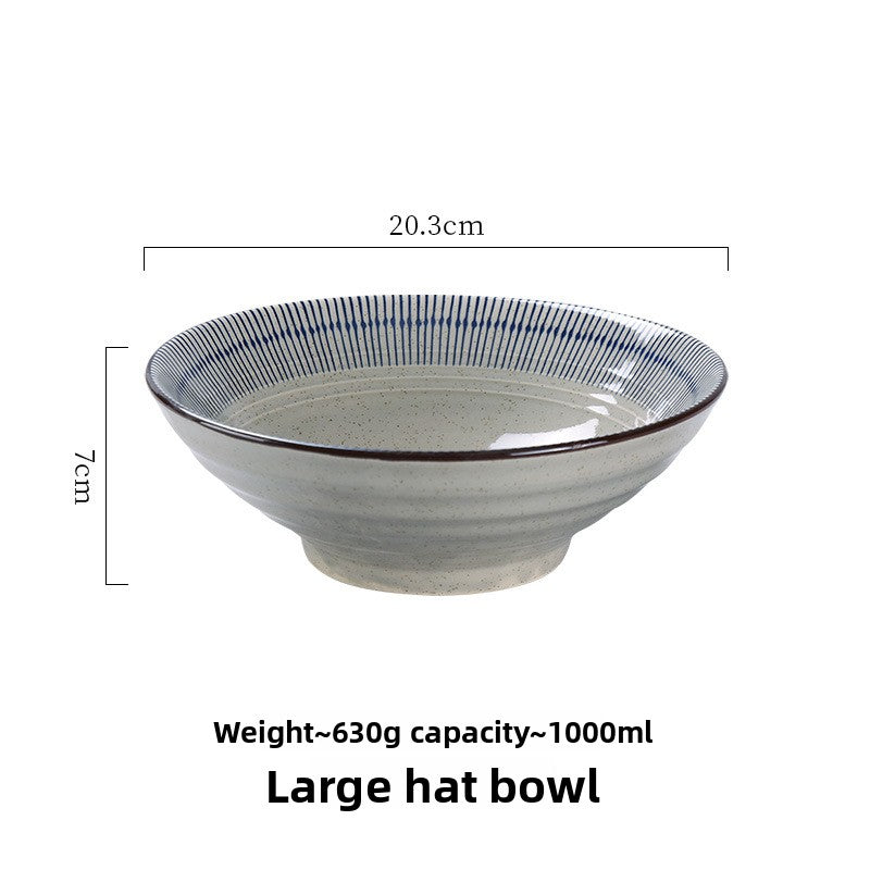 Angled hero shot of the Japanese style tokusa stripe ceramic noodle bowl