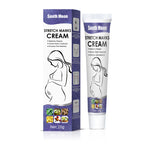 Glass jar of stretch mark cream open on a bathroom shelf in soft morning light