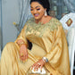 Close view of the gold lace applique yoke on the satin maxi dress neckline