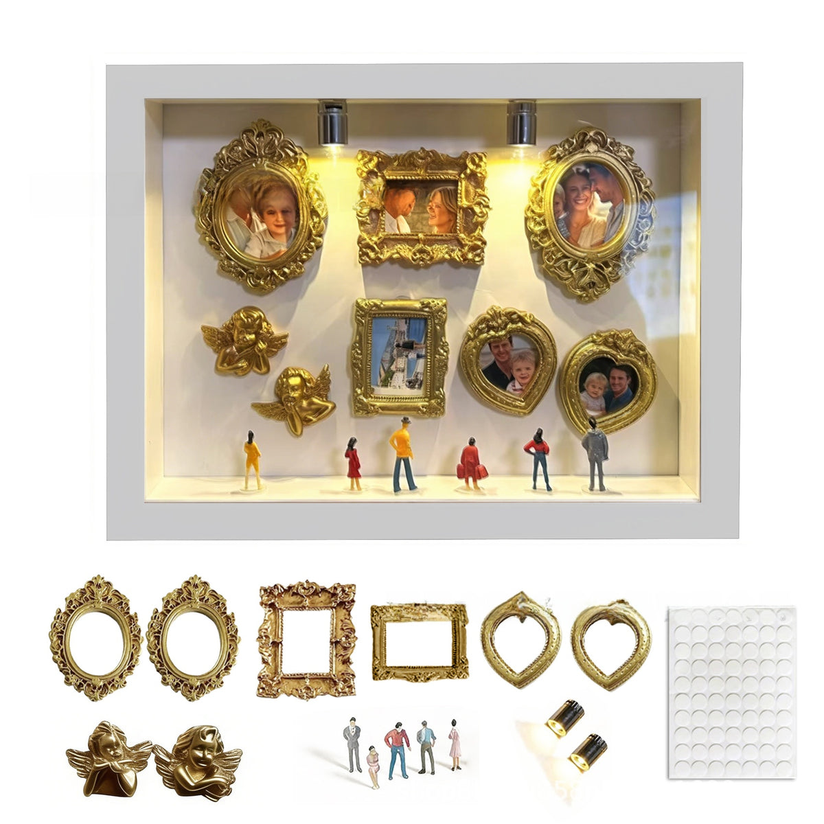 White shadow box set with six gold mini photo frames, two cherubs and five figurines above the loose pieces, white option