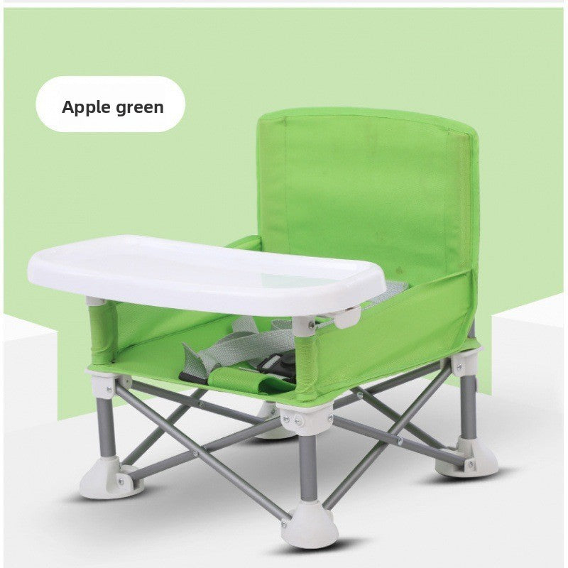 Folding baby feeding chair without canopy seen from three quarters with tray in place