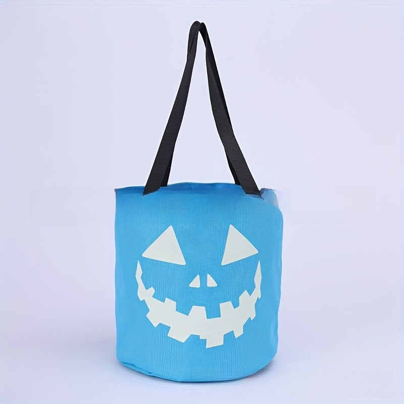 Halloween candy bucket in canvas with an open top and two sewn fabric handles