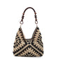 Black and cream open-weave hobo bag with a dark cord and wooden bead handle on a plain white studio background