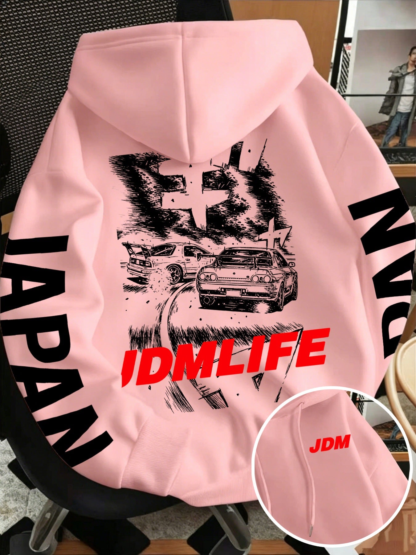 Drawstring hood and kangaroo pocket on the oversized JDM drift graphic fleece hoodie